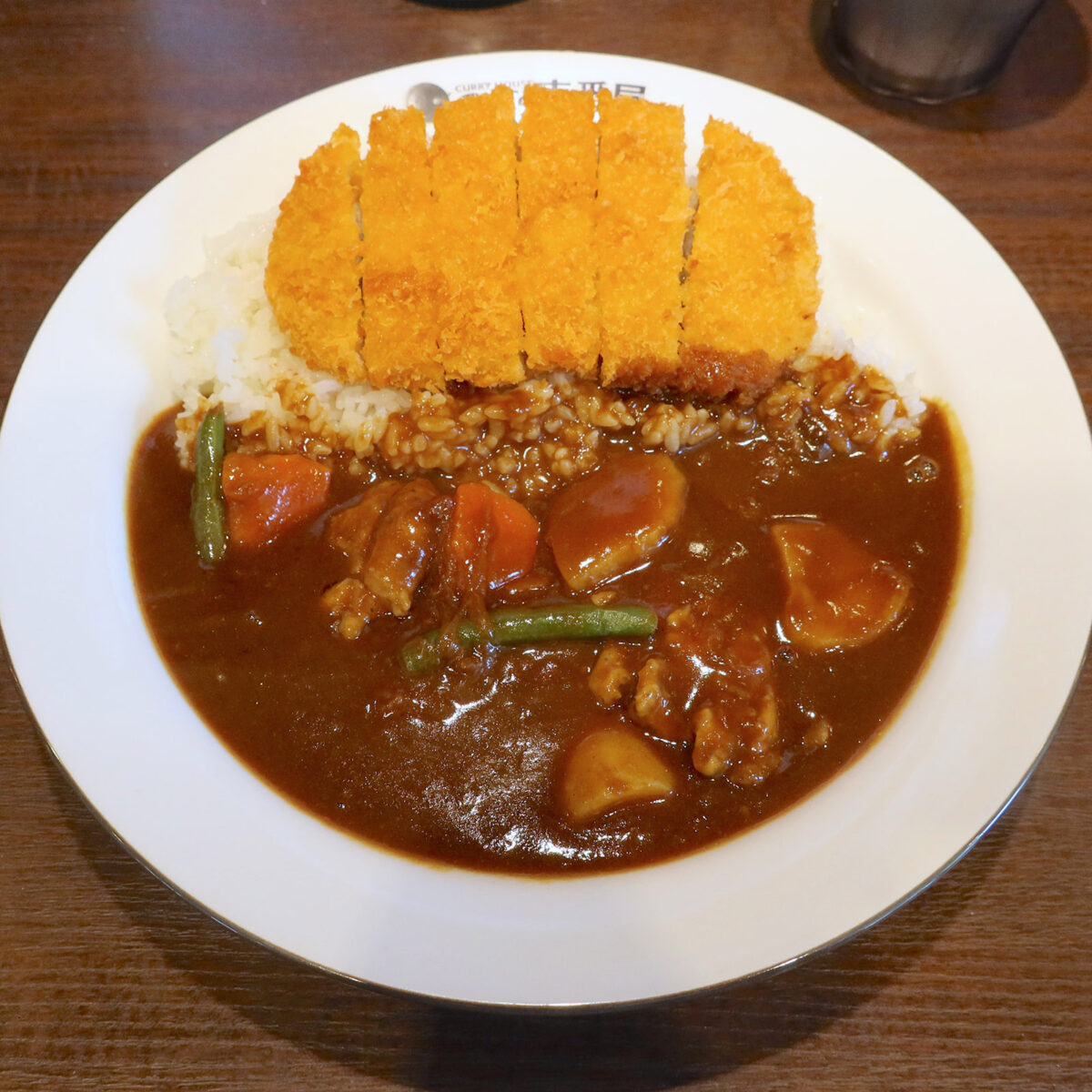 焙煎スパイスのチキンカレー（1,199円）＋ロースカツ（409円）